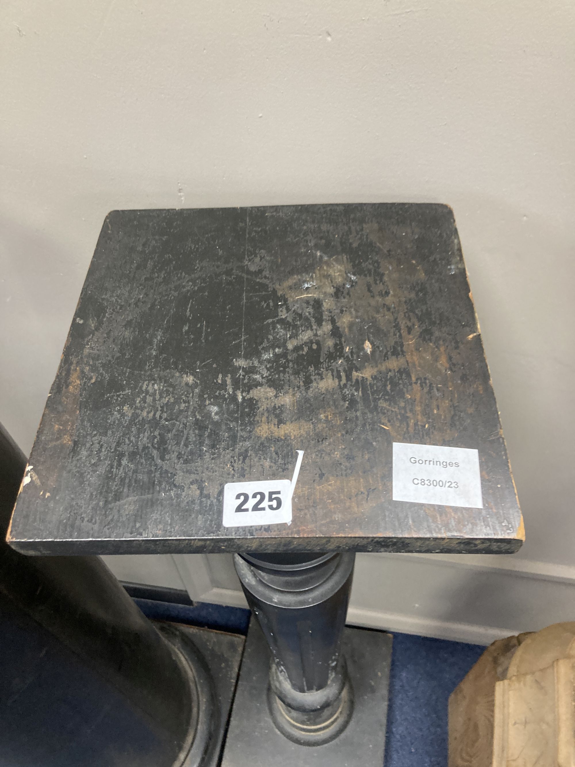 An ebonised pedestal, height 96cm